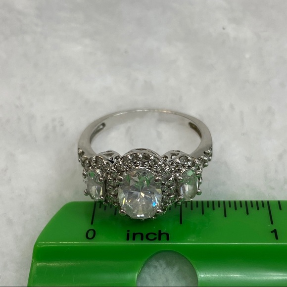Silver Color Ring With CZ Settings. Size 7.25 - Picture 4 of 7